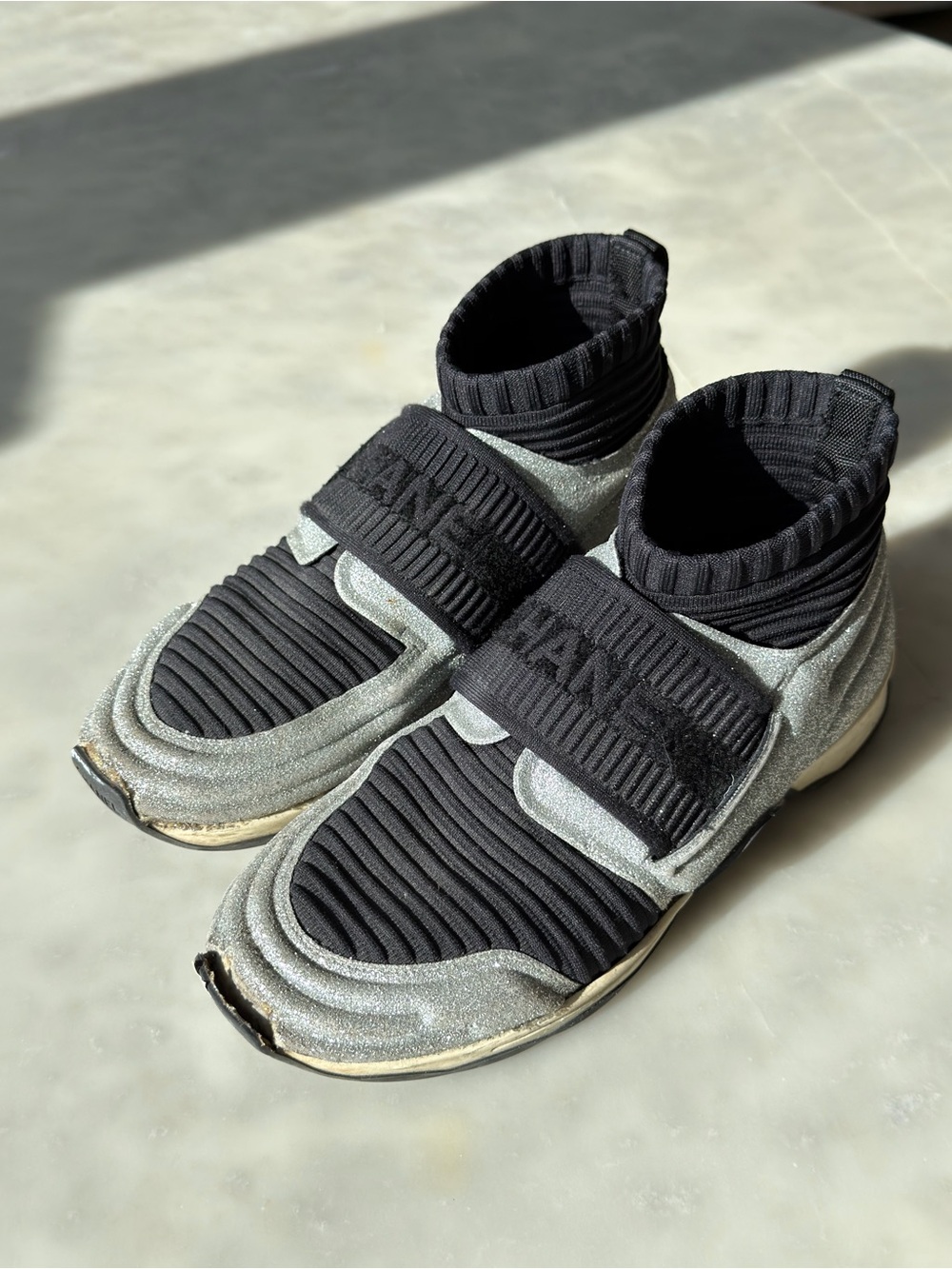 CHANEL Black Knit Sock Sneakers with Silver Glitter Trim